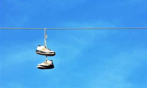 sneakers on power lines